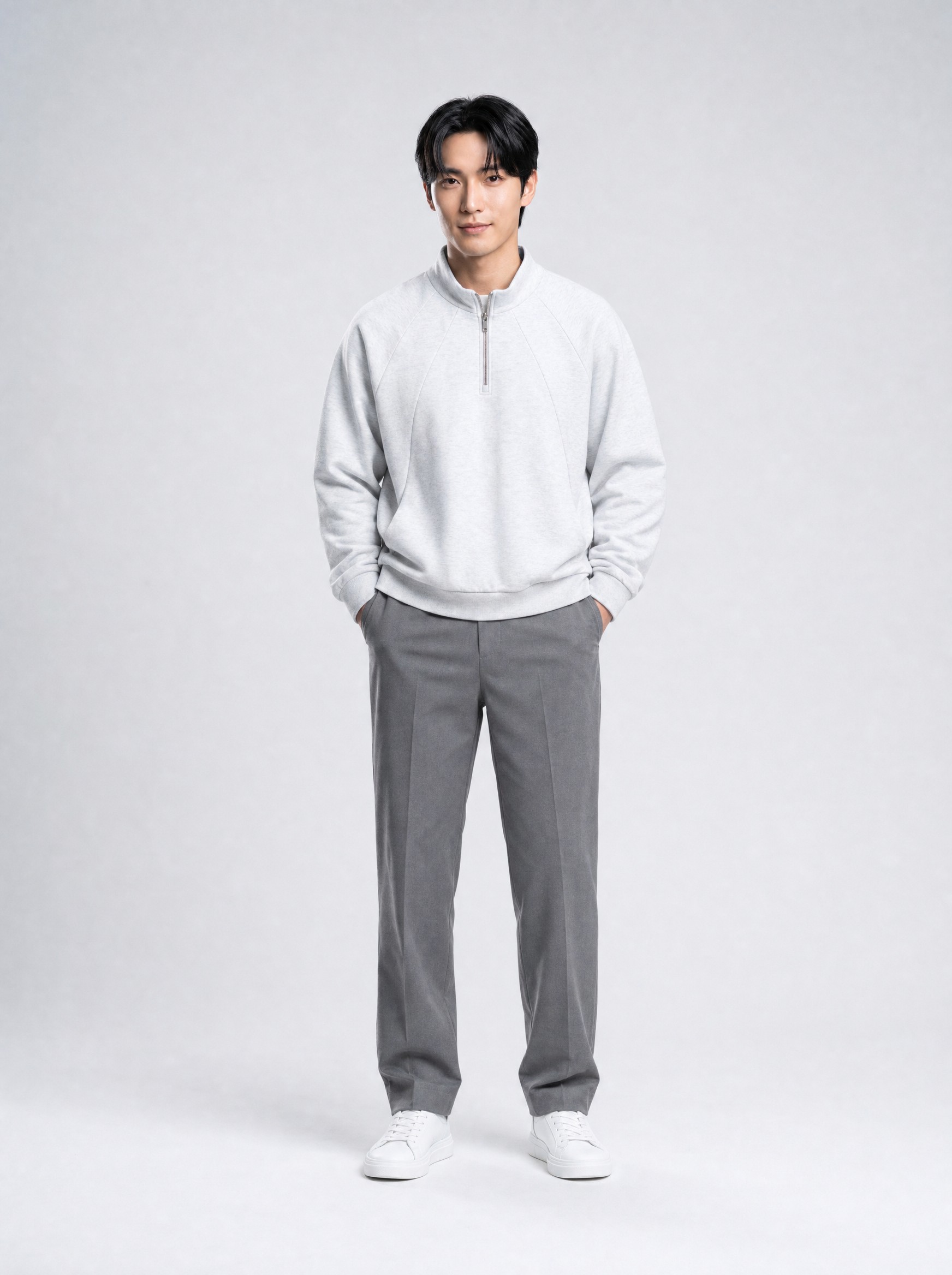 Heavyweight Half-Zip Sweatshirt in heather grey, AI-rendered on the house model from the product photo