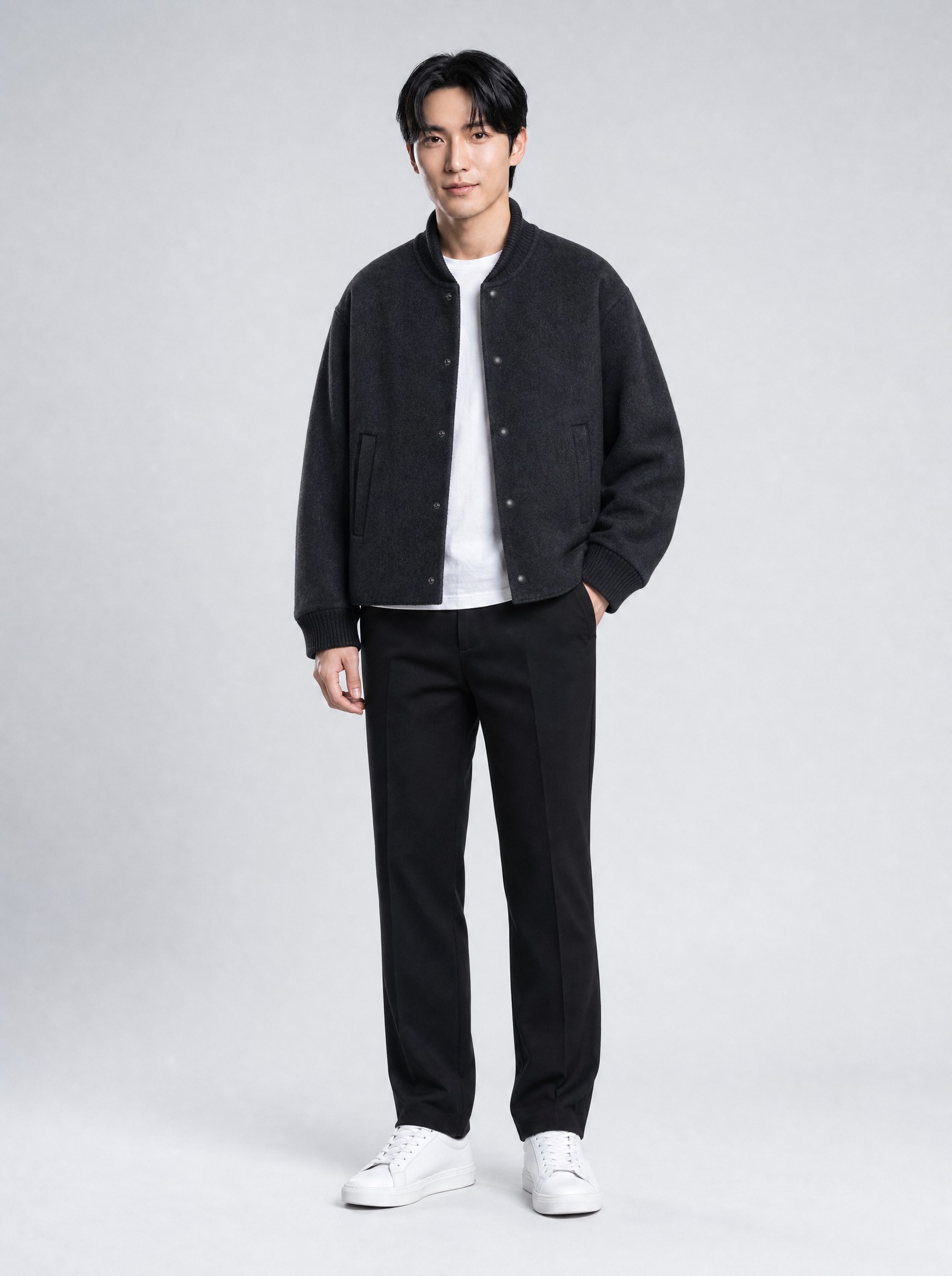 Garment in black, AI-rendered on the house model from the product photo