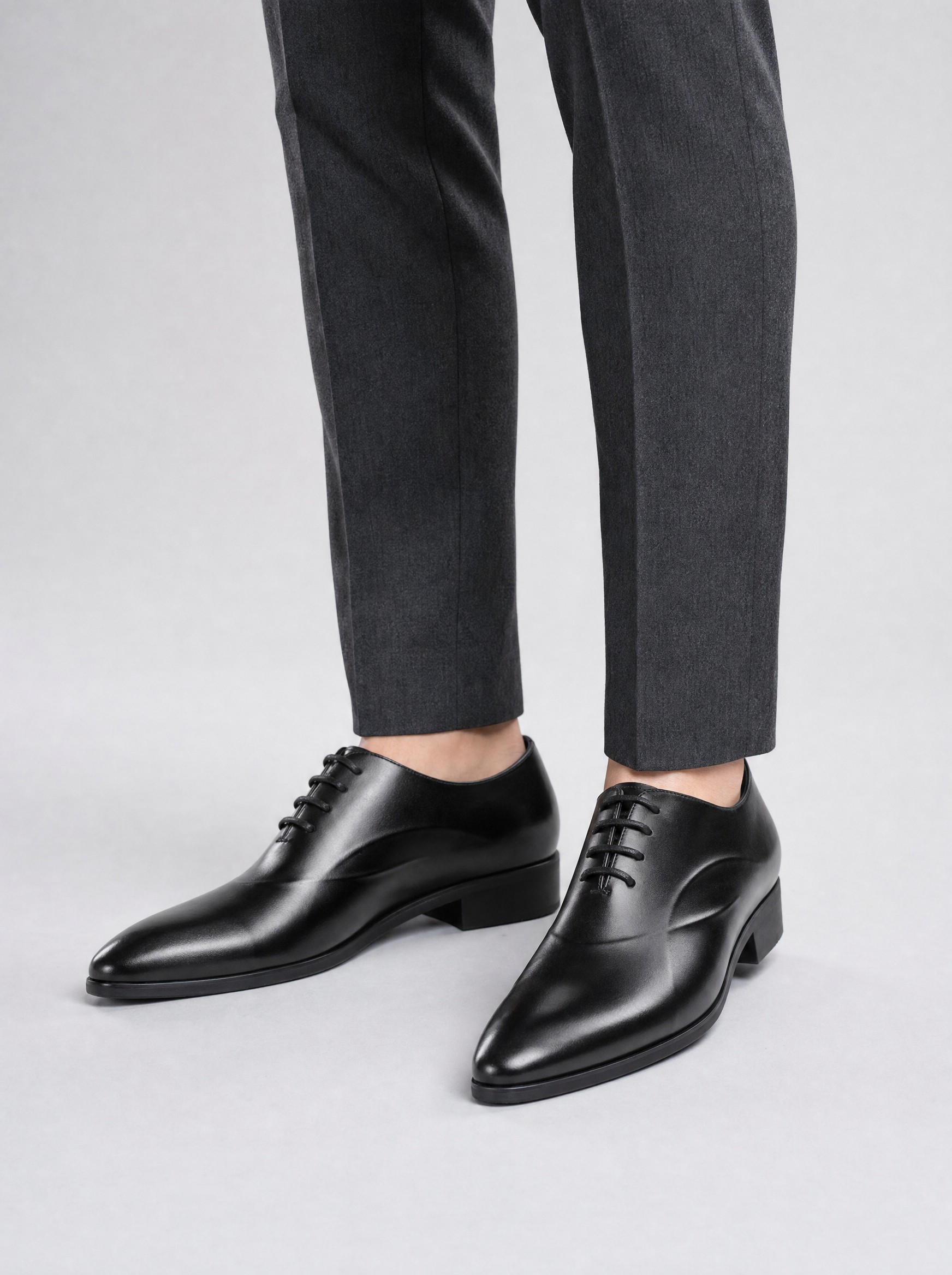 Hidden Lift Leather Derby in black, AI-rendered on the house model from the product photo