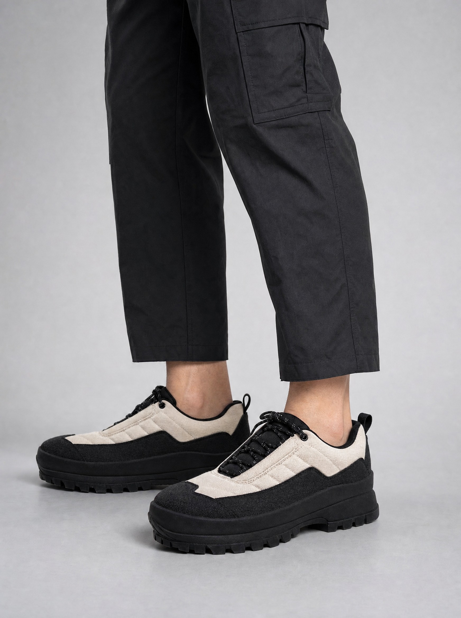 Quilted Trail Shoe in sand white, AI-rendered on the house model from the product photo