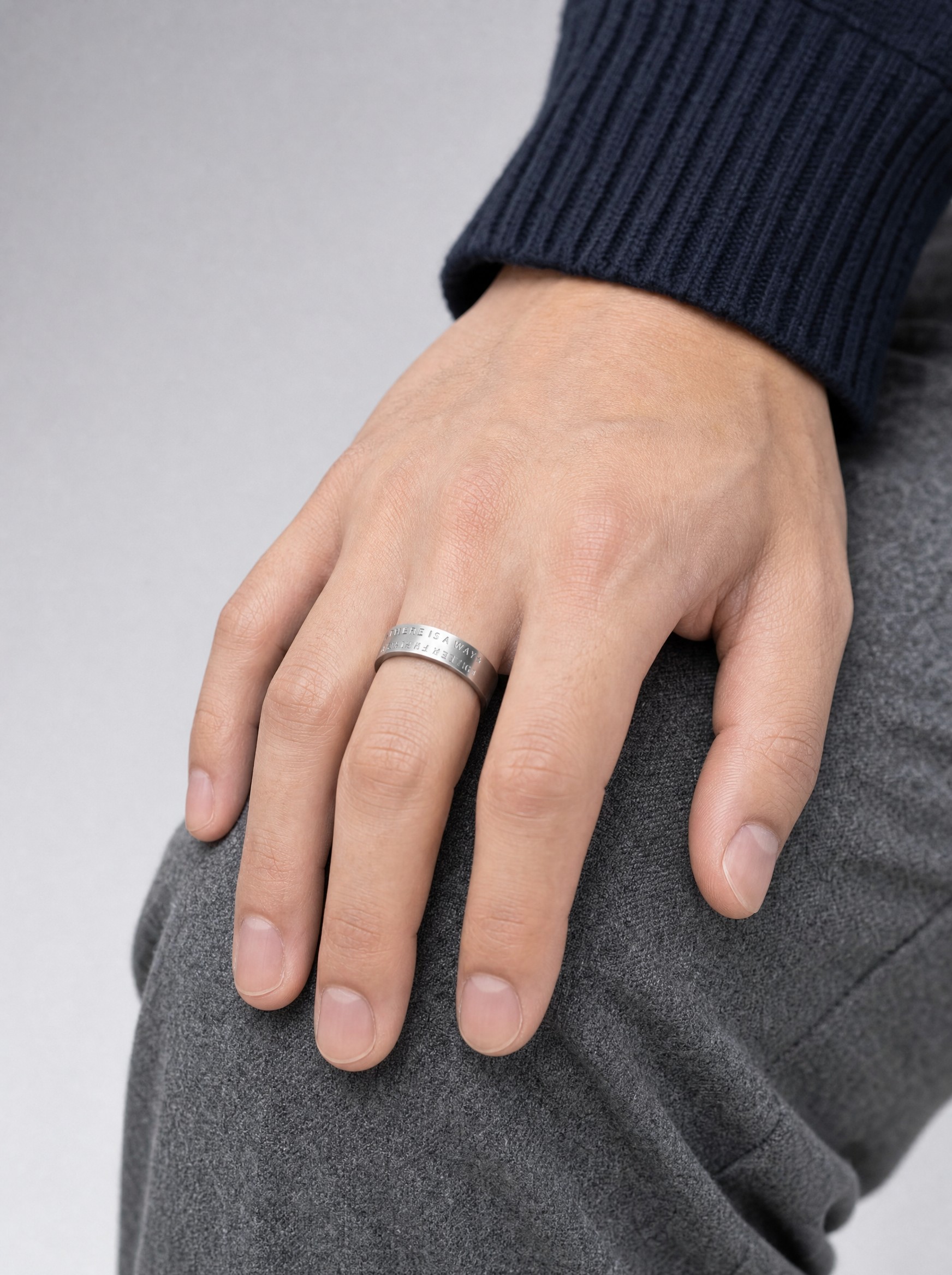 Brushed Steel Band Ring in silver, AI-rendered on the house model from the product photo