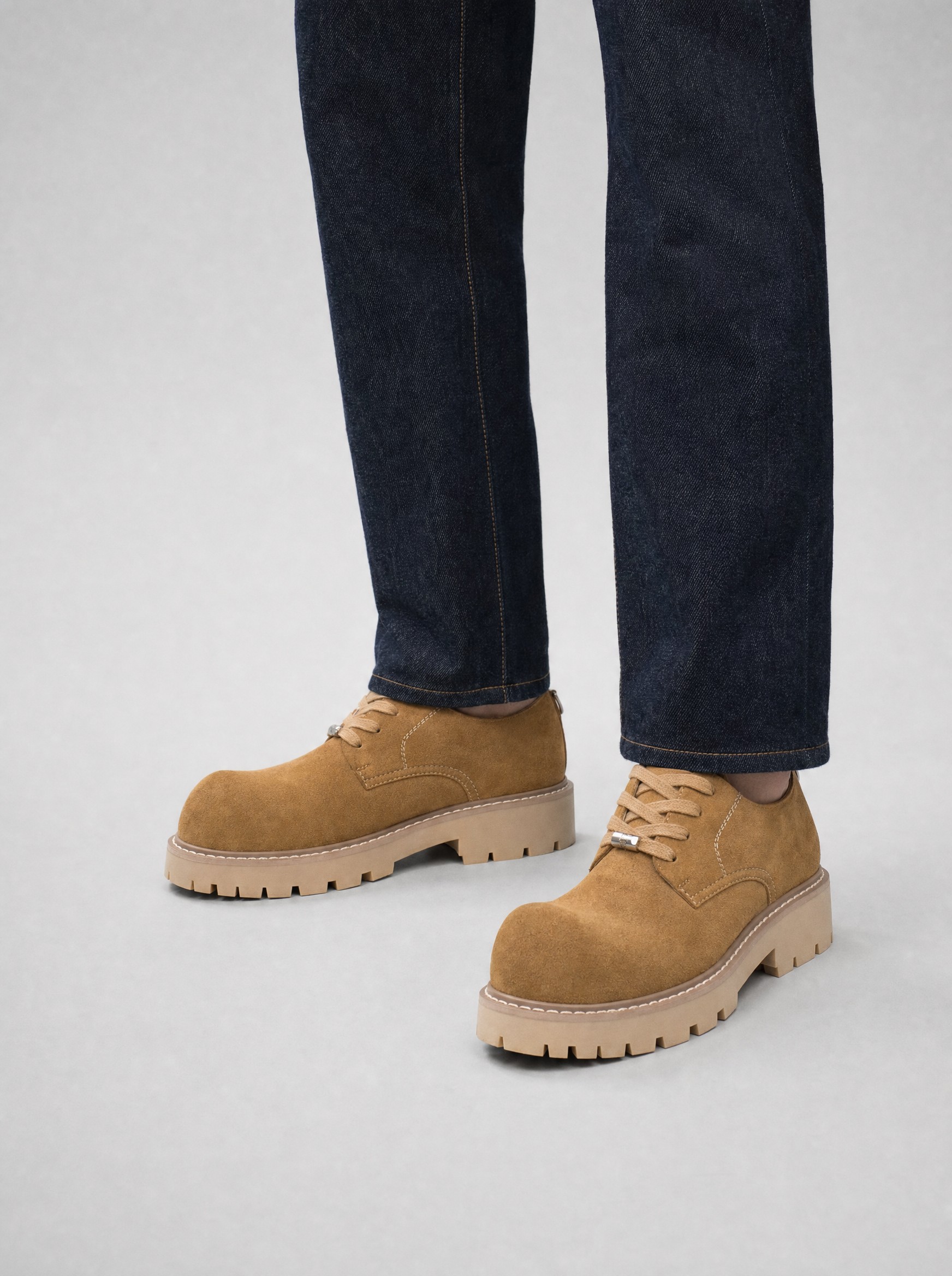 Lug-Sole Suede Derby in tan brown, AI-rendered on the house model from the product photo